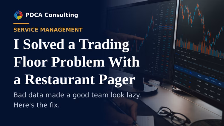 Service desk case study: trader pointing at market data screens on a busy trading floor